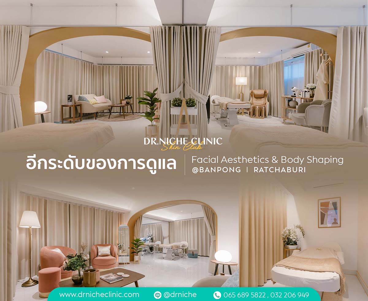 A serene treatment area with a bed, comfortable chairs, and a large mirror for personal care.